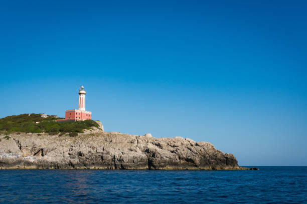 istock Faro di Punta Carena Lighthouse Tower at Capri in Italy 2182987586