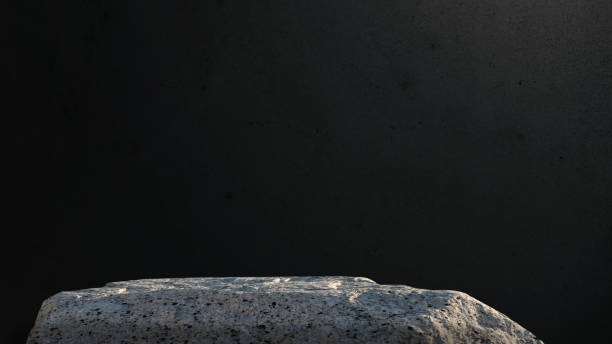 istock Stone Rock Podium on Black Cement Stone Wall for Product present,Studio Background with light on Clifft Rock stand Display Design,Empty Backdrop Background for Black Friday or Spa,Cosmetic promotion 2182995889
