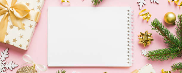 istock Christmas blank greeting card mock-up scene. Creative layout made of Christmas tree branches and paper card note. Flat lay. Nature New Year concept 2182997012
