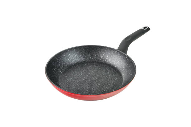 istock Red Flying black pan isolated with clipping path on white background. Clous up. High resolution image. Can be used for self design. 2182999575