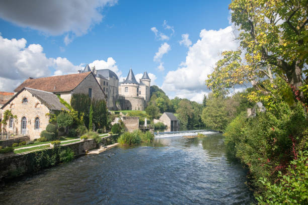 istock Small castle on the edge of a river with a waterfall 2183000234