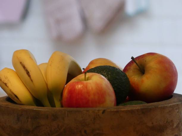 istock Wooden bowl with fresh fruits 2183000583