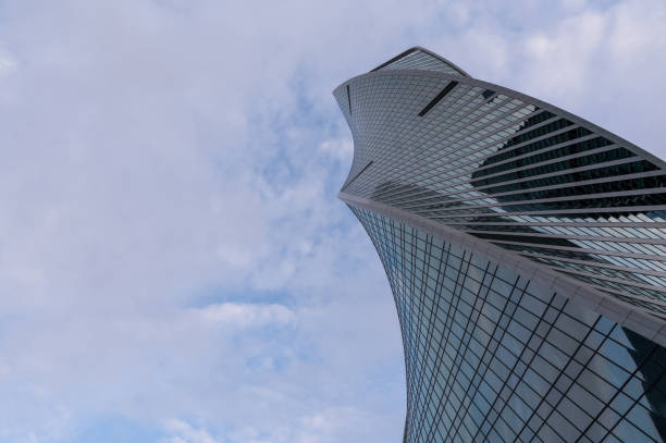 istock Skyscrapers in business district against blue sky. 2183007211