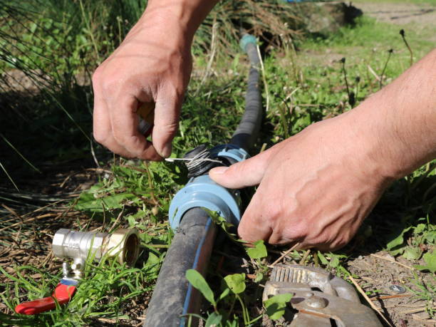 istock A person seals the threads of a fitting with plumbing thread 2183009237