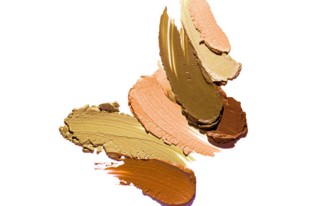 Texture of smudge palette cosmetic bb or cc cream foundation or concealer liquid set background