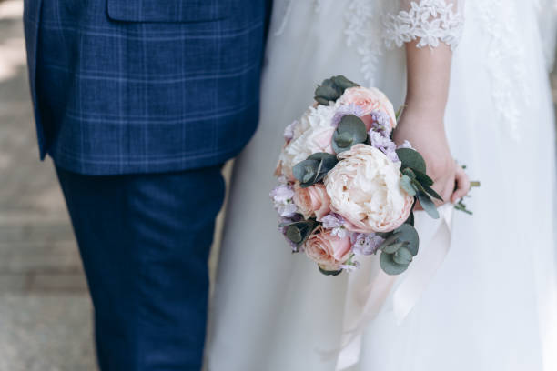 istock wedding bouquet in bride hands 2183014260