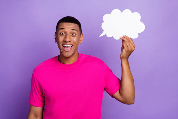 istock Portrait of charming positive handsome student man has genius solution his financial problems hold paper sky intellectual isolated on purple color background 2183015287