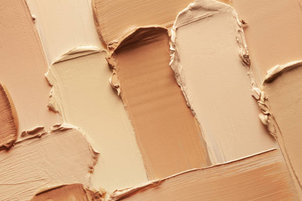 istock Texture of smudge palette cosmetic bb or cc cream foundation or concealer liquid set background 2183015361