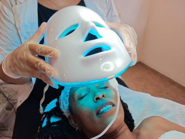 istock Applying LED Light Therapy Mask for Facial Treatment. 2183022661