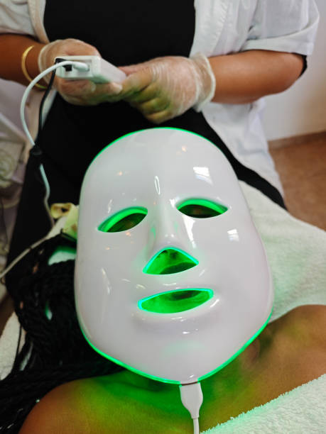 istock LED Light Therapy Facial with Green Glow. 2183022762