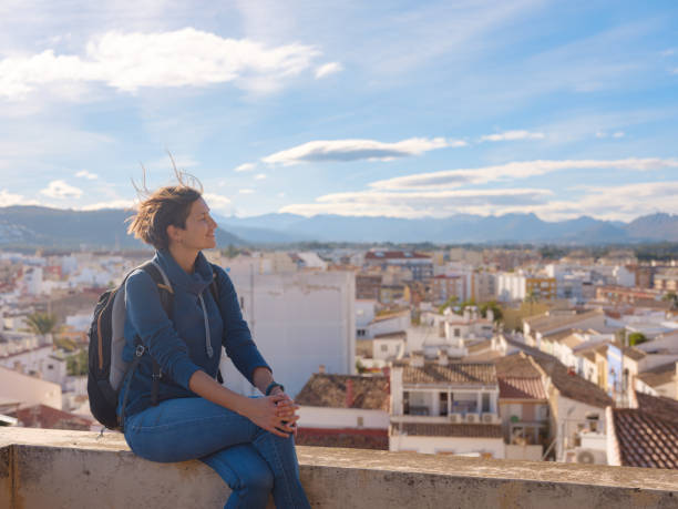 istock Young woman exploring historic castle in Denia 2183023709