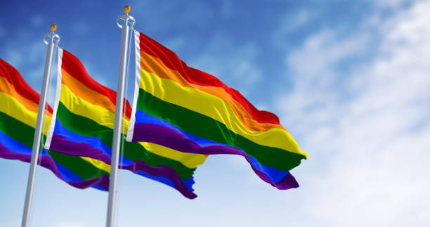 istock Rainbow flag waving on a clear day 2183026932