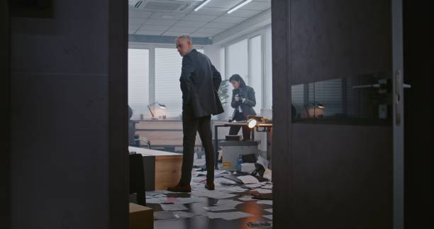 istock Robbery case in office room: Crime investigation team working 2183028595