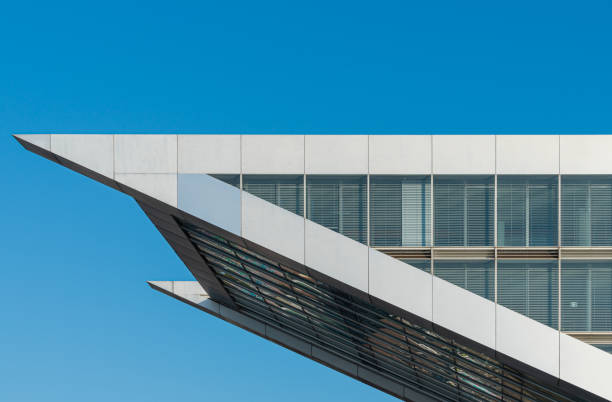 istock Modern acute-angled office building against clear sky 2183040037