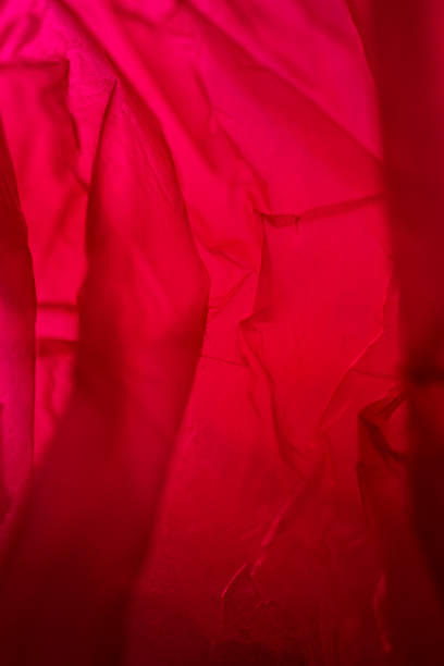 istock Extreme close up of red empty plastic bag background. 2183044548