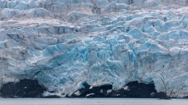 istock Ice formations and textures of Esmark Glacier in Svalbard during a clear day 2183048502