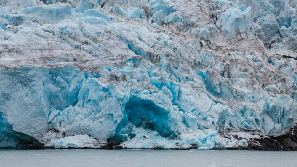 istock Esmark Glacier in Svalbard displaying striking blue ice formations along the tranquil waters 2183048591