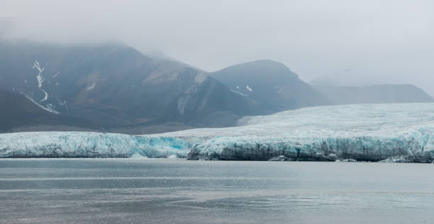 istock Esmark Glacier in Svalbard reflects stunning ice formations under cloudy skies 2183048690