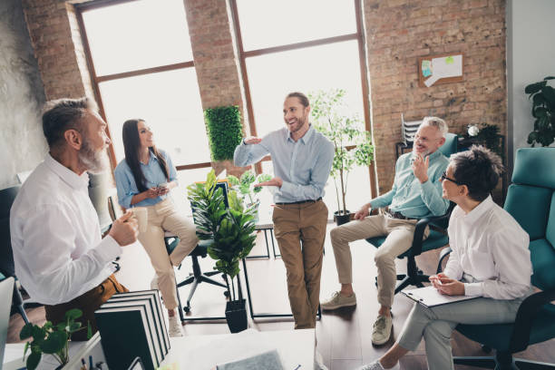 istock Photo of coworking project teamwork people brainstorming coaching work together conference meeting successful nice light office 2183049581