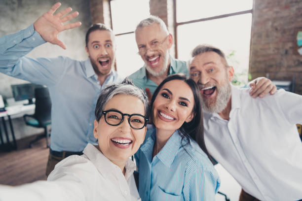 istock Photo of teamwork startup partners take selfie cheerful smile comfortable nice creative startup office loft room interior 2183049766