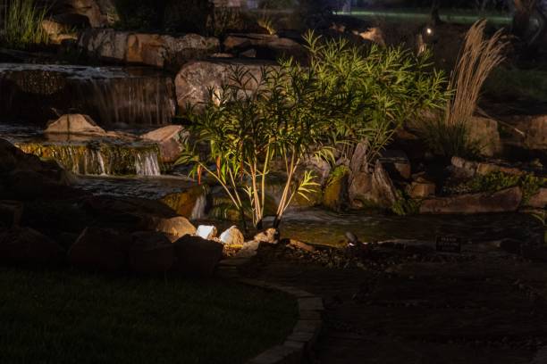 istock Serene Night Scene of a Landscaped Waterfall 2183049981