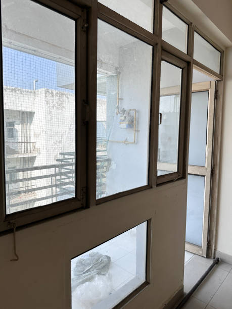 istock Image of empty room with wall featuring hole for air conditioning unit installation,  AC , home improvement, renovation, cooling solution concepts 2183050948