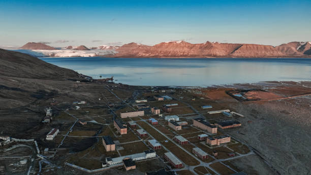 istock Exploring the abandoned settlement of Pyramiden in Svalbard during a clear sunset 2183051768