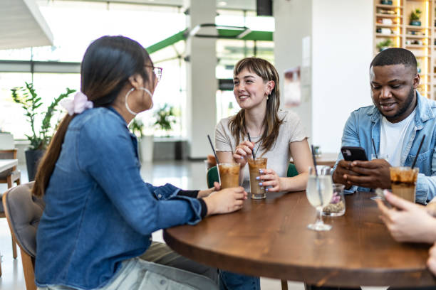 istock Cheerful friends in a cafe 2183052777