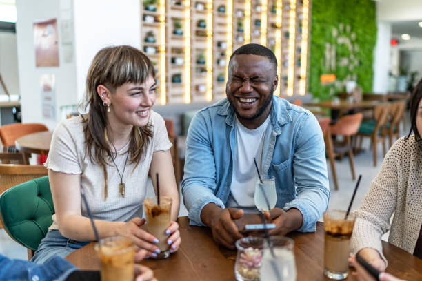 istock Cheerful friends in a cafe 2183052821