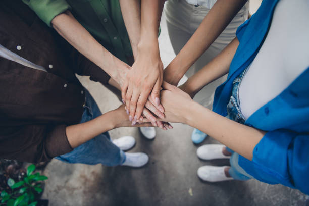 istock High angle view cropped photo of successful corporate women pile stack handshake office business center indoors 2183054678