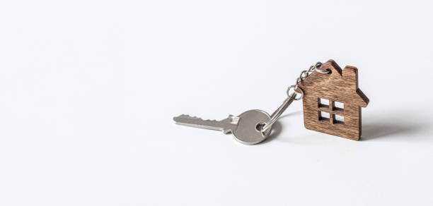 istock A House Key featuring a HouseShaped Keychain, perfect for all Homeowners and their needs 2183058625