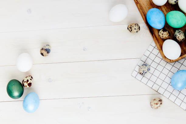 istock colorful eggs randomly lie on the table and gifts holidays 2183059434