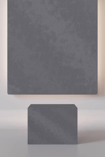 istock Minimalist concrete podium with textured gray backdrop panel illuminated from behind. Modern, industrial setup, ideal for product displays, branding. Offering sleek and contemporary aesthetic. 3D. 2183067811