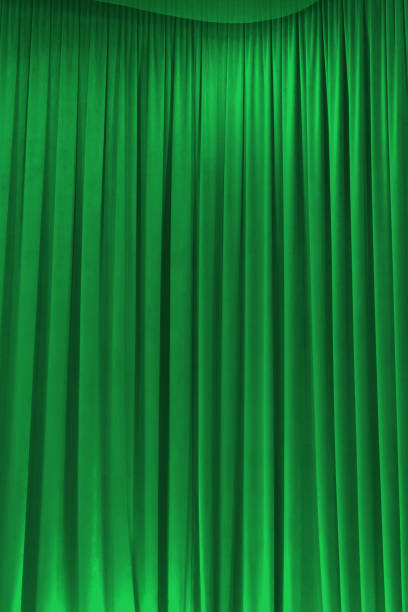 istock Green theater curtain that dropped down as a straight line. Background for inserting text, empty spaces 2183068734
