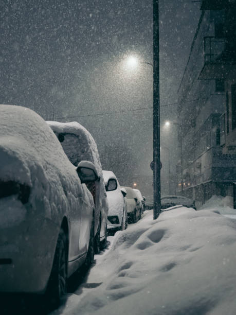 istock Big snowdrift near parked vehicles 2183071830