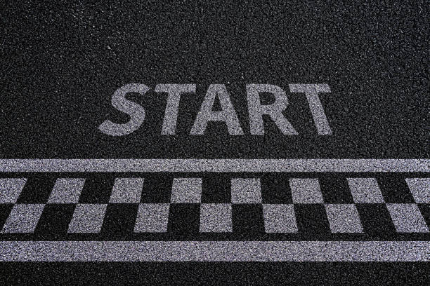 istock Start, finish line. asphalt road racing texture background. top view 2183076826