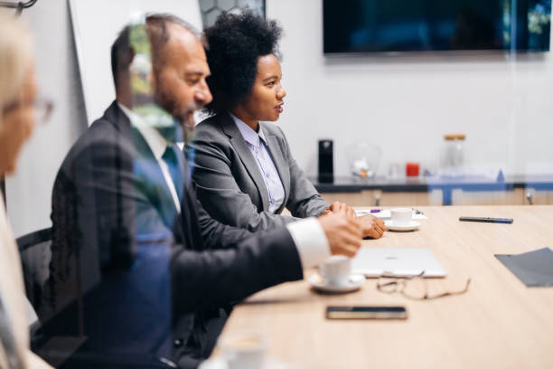 istock Team meeting with focus on female professional 2183079048