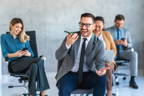istock Happy businesspeople laughing while collaborating on a new project in an office. 2183079253