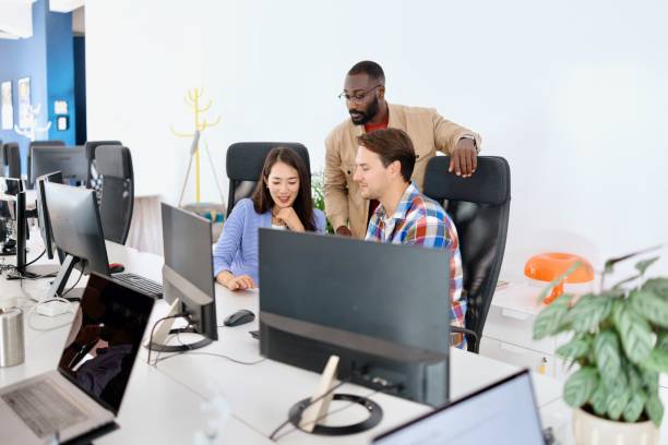 istock Manager advising his colleagues about a new project 2183082188