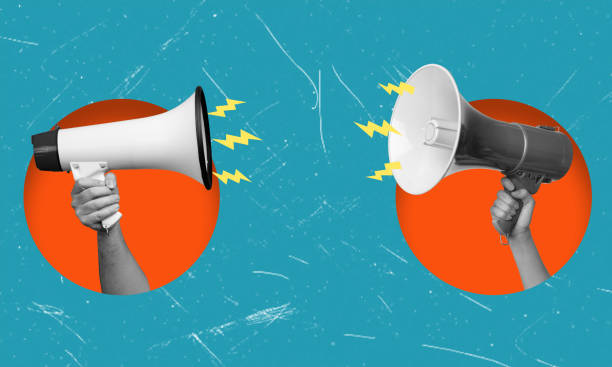 istock Contemporary art collage depicting two megaphones facing each other. 2183082441