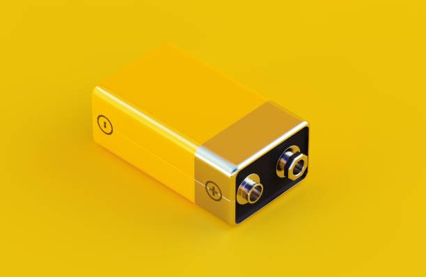 istock Yellow 9V Battery On Yellow Background 2183086478