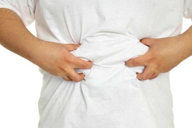 istock Concept of weight problems, fat man isolated on white background 2183089711