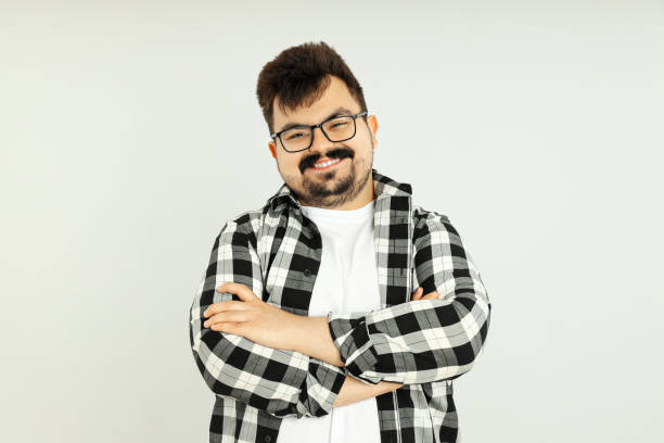 istock Concept of people, young fat man on light background 2183090128