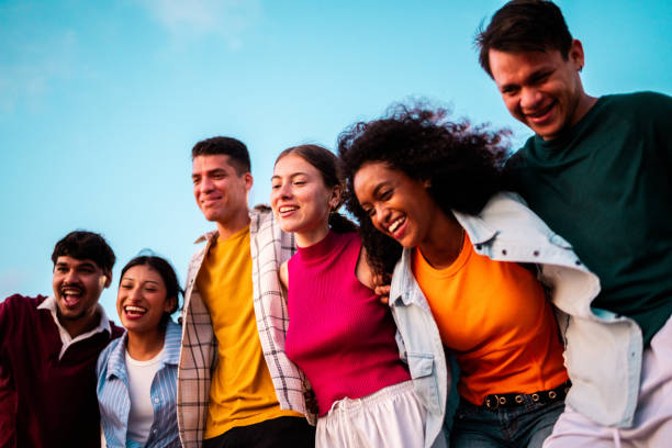istock Young friends embracing outdoors 2183090880