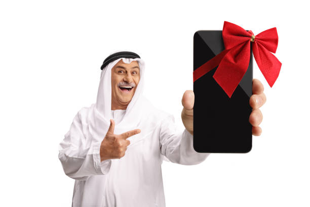 istock Happy arab man smartphone winner pointing at the screen 2183098312