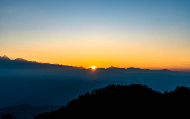 istock Sunrise ove the Mountain 2183098983