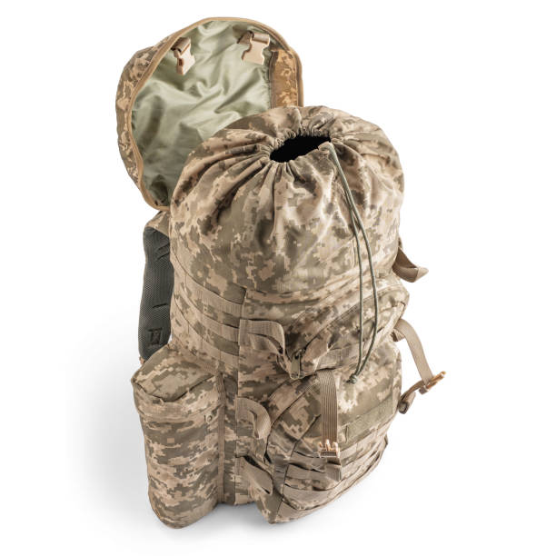 istock Military backpack in pixel camouflage. Tactical military ammunition. 2183101359