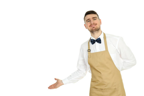 Young man waiter isolated on white background