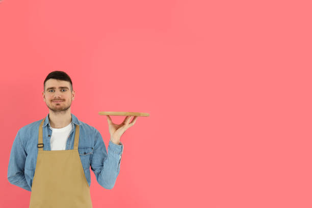 Concept of profession with young man waiter