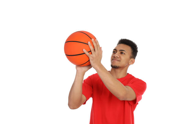 istock Young man with basketball ball isolated on white background 2183116144